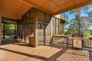 Eagles Nest deck with a covered outdoor room, Fishtrap Village Rental Cabins
