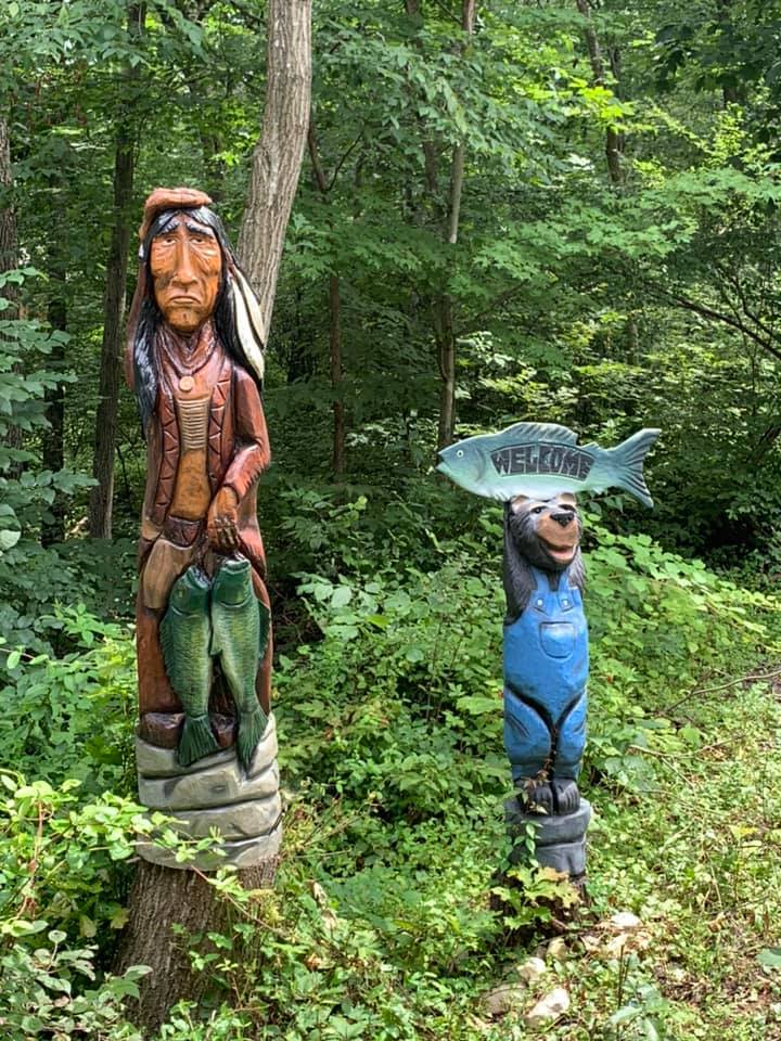 Fishtrap Village - entrance statues
